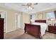 Cozy bedroom featuring a neutral color scheme, carpeted floors, and a large window at 1965 Charlotte Hwy # 401, Mooresville, NC 28115