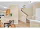 Bright dining area leads to staircase at 1965 Charlotte Hwy # 401, Mooresville, NC 28115