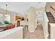 Bright and airy dining area with wood table and chairs, adjacent to the kitchen at 1965 Charlotte Hwy # 401, Mooresville, NC 28115