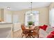Bright dining area with wooden table set near a large window at 1965 Charlotte Hwy # 401, Mooresville, NC 28115