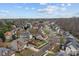 Expansive aerial shot of the residential area, showcasing the layout of streets, homes, and community landscaping at 20601 Belair Ct, Cornelius, NC 28031