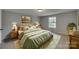Cozy bedroom with a comfortable bed, soft lighting, and a relaxing atmosphere at 210 Knox St, Clover, SC 29710