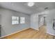 Dining room features hardwood floors, neutral paint colors, and windows with white blinds at 210 Knox St, Clover, SC 29710
