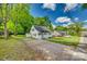 Charming two-story home with white siding, black shutters, and a large front yard at 210 Knox St, Clover, SC 29710