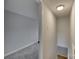 Hallway leading to carpeted bedroom and stairs at 210 Knox St, Clover, SC 29710