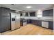 Updated kitchen features stainless steel appliances, granite countertops, and dark espresso cabinets at 210 Knox St, Clover, SC 29710