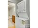 Laundry room with stacked washer and dryer with view into bathroom at 210 Knox St, Clover, SC 29710