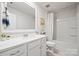 Sparkling clean bathroom with white cabinetry, a tub, and tiled floors at 22014 Finworthy Ln, Huntersville, NC 28078