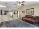 Spacious living room with a vaulted ceiling has wood floors and a traditional rug at 228 Grayland Rd, Mooresville, NC 28115