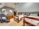 Inviting bedroom featuring two beds, dresser, and a comfortable reading chair at 2331 Gill Jordan Rd, Chester, SC 29706