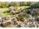 Lush garden area with mature plants, a charming shed and other outdoor structures on a sunny lot at 2331 Gill Jordan Rd, Chester, SC 29706