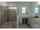 Modern bathroom boasts a glass-enclosed shower, vanity area, and stylish fixtures at 246 Sweet Briar Dr, Fort Mill, SC 29707