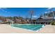 A large community pool with several lap lanes and a community center in the background at 246 Sweet Briar Dr, Fort Mill, SC 29707