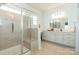 Beautiful main bathroom features a glass shower, double sinks, and ample counter space at 246 Sweet Briar Dr, Fort Mill, SC 29707