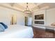 Main bedroom suite with hardwood floors, and modern fireplace at 246 Sweet Briar Dr, Fort Mill, SC 29707