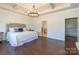 Large primary bedroom suite with hardwood floors and attached bathroom at 246 Sweet Briar Dr, Fort Mill, SC 29707