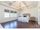 Spacious primary bedroom with decorative ceiling beams and chandelier at 246 Sweet Briar Dr, Fort Mill, SC 29707