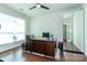Bright office space with hardwood floors, ceiling fan, large window and mirrored closet at 246 Sweet Briar Dr, Fort Mill, SC 29707