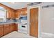 Well-lit kitchen with wooden cabinets and classic appliances at 2922 Dunlavin Way, Charlotte, NC 28205