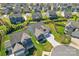 Aerial view of home featuring landscaping, a two-car garage, and a covered front porch at 4315 Innisfree Ct, Indian Trail, NC 28079