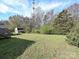 Expansive backyard offers a large grassy area perfect for outdoor activities at 464 Willetta Nw Pl, Concord, NC 28027