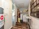Bright and functional laundry area with washer, dryer, and ample storage space at 464 Willetta Nw Pl, Concord, NC 28027