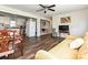 Open-concept living area flows into the kitchen, highlighted by hardwood floors and ample natural light at 464 Willetta Nw Pl, Concord, NC 28027