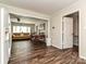 Open living space seamlessly connects the dining area to the kitchen and a separate room at 464 Willetta Nw Pl, Concord, NC 28027