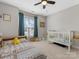 bedroom with carpet, a ceiling fan, and window at 5013 Watercrest Trl, Belmont, NC 28012