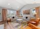 Spacious living room features large windows, plush seating, and stylish decor at 5013 Watercrest Trl, Belmont, NC 28012