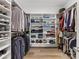 Spacious walk-in closet with custom shelving for clothes and shoes, great for organization and storage at 5013 Watercrest Trl, Belmont, NC 28012