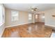 Bright living room featuring hardwood floors, ample natural light, and neutral wall colors at 502 Crawford St, Shelby, NC 28150