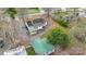 Aerial view of the property, highlighting the home, carport, and surrounding greenery at 609 Eddleman Rd, Kannapolis, NC 28083