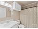 Bathroom featuring a vanity with a marble countertop and neutral patterned shower curtain at 609 Eddleman Rd, Kannapolis, NC 28083
