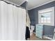 A bathroom with a shower, toilet, drawers and a towel at 609 Eddleman Rd, Kannapolis, NC 28083