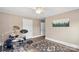 This bedroom features hardwood floors, neutral paint, and two doors at 609 Eddleman Rd, Kannapolis, NC 28083