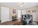 This bedroom features hardwood floors, natural light and neutral paint at 609 Eddleman Rd, Kannapolis, NC 28083