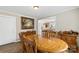 Open concept dining room with wooden furniture and bright lighting at 609 Eddleman Rd, Kannapolis, NC 28083