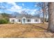 A charming house with a well-maintained lawn and a new roof at 609 Eddleman Rd, Kannapolis, NC 28083