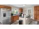 A kitchen with stainless steel appliances and a breakfast bar with sink at 609 Eddleman Rd, Kannapolis, NC 28083