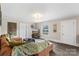 Living room with a comfy couch, throw blanket, and hardwood floors at 609 Eddleman Rd, Kannapolis, NC 28083