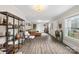 Spacious living room with hardwood floors, shelving and lots of natural light at 609 Eddleman Rd, Kannapolis, NC 28083