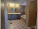 Primary bath with dual sinks and a corner soaking tub at 8183 Hallman Mill Rd, Vale, NC 28168