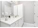 Bright bathroom featuring white cabinets, white countertops, and tile floors at 8462 Highland Glen Dr, Charlotte, NC 28269