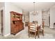 Elegant dining room featuring a chandelier and an antique hutch at 8462 Highland Glen Dr, Charlotte, NC 28269