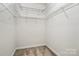 Spacious walk-in closet with multiple wire shelves for lots of functional storage at 8462 Highland Glen Dr, Charlotte, NC 28269