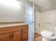 Bathroom featuring a wood vanity and a bathtub and shower combination at 9307 Harlow Creek Rd, Huntersville, NC 28078