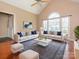 Bright living room with hardwood floors, large windows and neutral decor at 9307 Harlow Creek Rd, Huntersville, NC 28078