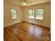Bright bedroom with hardwood floors and an abundance of natural light at 1003 Woodland Dr, Gastonia, NC 28054