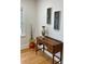 Bright hallway featuring hardwood floors and decorative accents at 1003 Woodland Dr, Gastonia, NC 28054